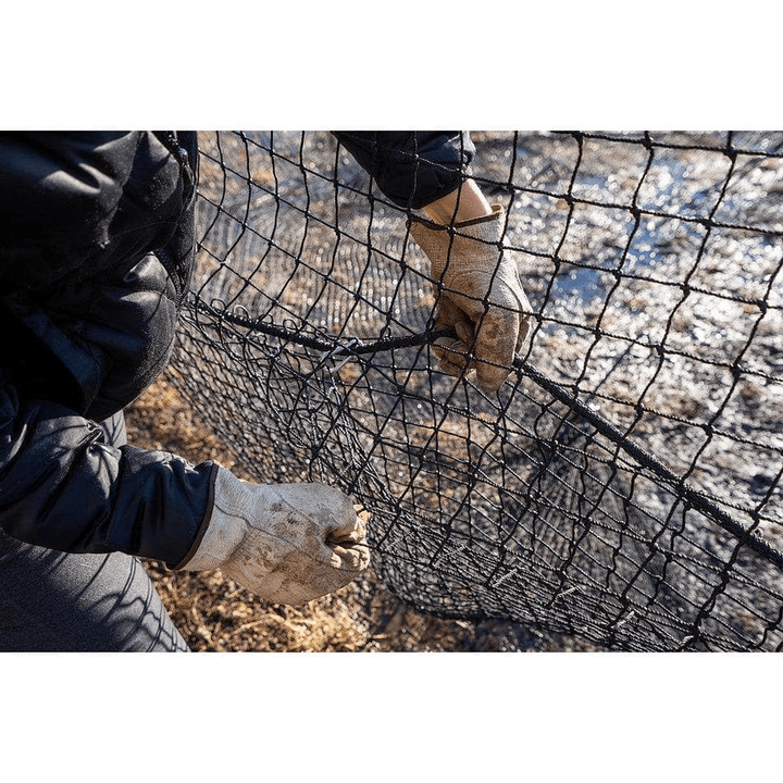Repairing a Pig Brig wild boar trap system