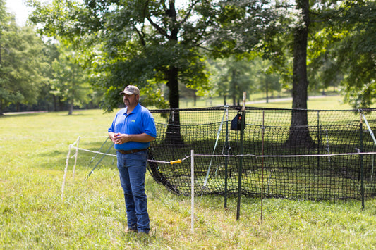 Man standing next to Pig Brig Trap System