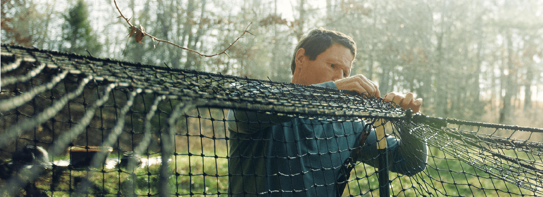 Man setting up Pig Brig wild boar trap